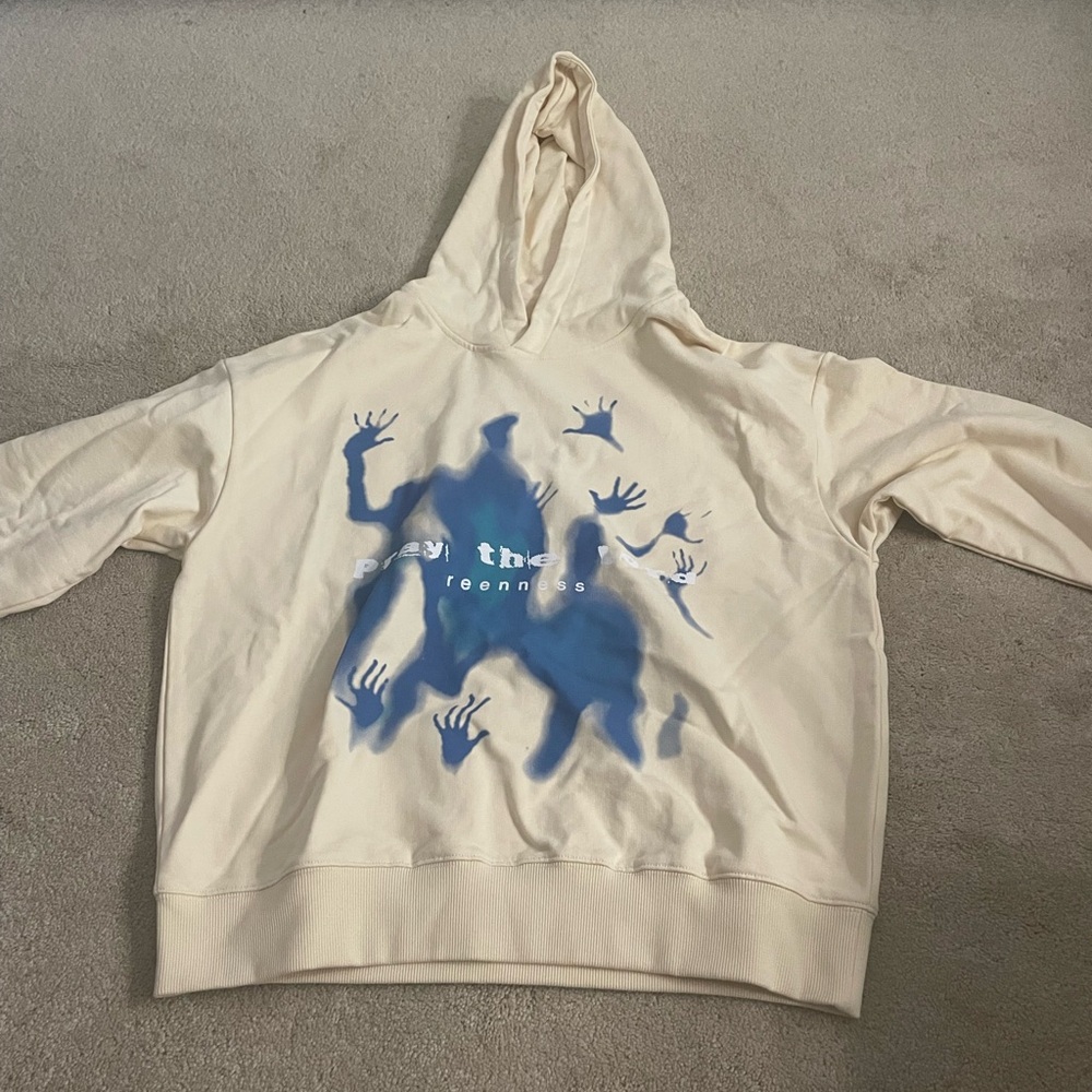 alfreic eden hoodie, size XS, like new.color cream and blue